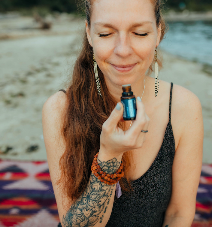 Lou Meggiato of Mandala Essentials with doTERRA bottle